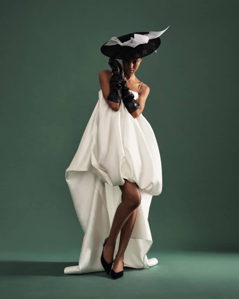 Black sinamay/tulle disc with drape of white crinoline